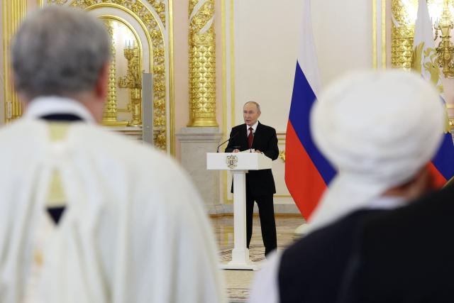 Russian President Vladimir Putin delivers a speech during a ceremony to receive letters of credence from newly appointed foreign ambassadors at the Grand Kremlin Palace in Moscow on January 15, 2026. (Photo by Ramil Sitdikov / POOL / AFP)