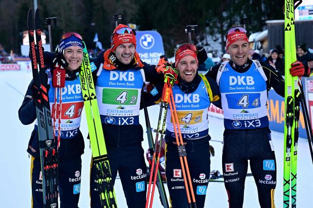 Third placed (L-R) Germany's Justus Strelow, Germany's Danilo Riethmuller, Germany's David Zobel and Germany's Philipp Nawrath pose for a photo after the men's 4x7,5km relay competition of the IBU Biathlon World Cup in Ruhpolding, southern Germany on January 15, 2026. France won the event ahead of Norway and Germany. (Photo by Tobias SCHWARZ / AFP)