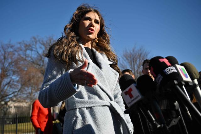 US Secretary of Homeland Security Kristi Noem speaks to reporters following a television interview outside of the West Wing of the White House in Washington, DC on January 15, 2026. (Photo by Mandel NGAN / AFP)