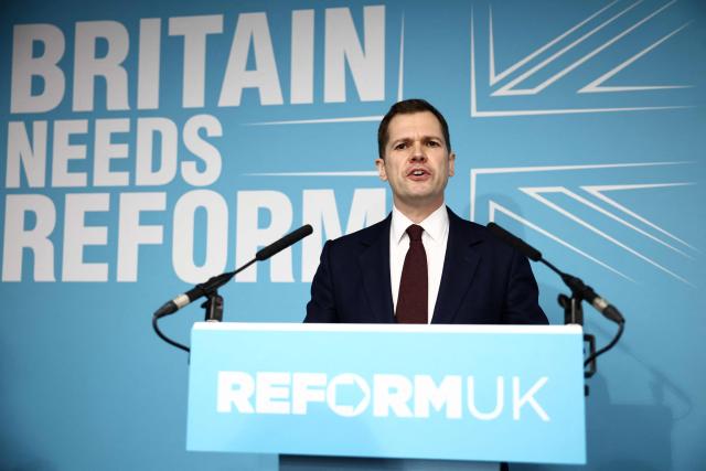 Britain's former Conservative Party Shadow Justice Secretary Robert Jenrick speaks, during a press conference to announce his defection to Reform UK, in central London on January 15, 2026. (Photo by Henry NICHOLLS / AFP)