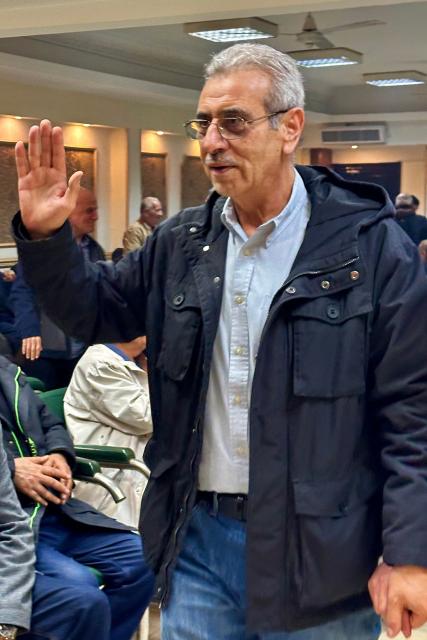 Ali Shaath, head of the Palestinian technocratic committee for managing the Gaza Strip, offers condolences to a Palestinian family, in Cairo on January 15, 2026. Gaza native and former Palestinian Authority deputy minister Ali Shaath will head the new technocratic committee set to administer the devastated Gaza Strip, mediating countries announced on January 14. A seasoned civil servant largely unknown to the wider public, Shaath was born in the southern city of Khan Yunis in 1958, later leaving to study in Cairo, a family member told AFP. (Photo by Mohammed Abed / AFP)
