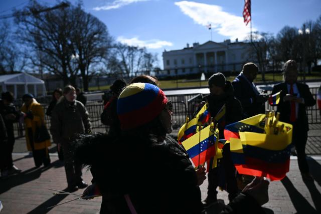 Supporters of the Venezuelan opposition demonstrate outside the White House as US President Donald Trump meets with Venezuelan opposition leader Maria Corina Machado in Washington, DC, on January 15, 2026. (Photo by Brendan SMIALOWSKI / AFP)
