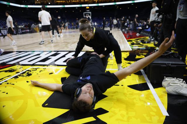 Orlando Magic’s German small forward #22 Franz Wagner gets treatment ahead the 2025/2026 NBA season basketball match between Memphis Grizzlies and Orlando Magic on January 15, 2026 in Berlin. (Photo by Odd ANDERSEN / AFP)