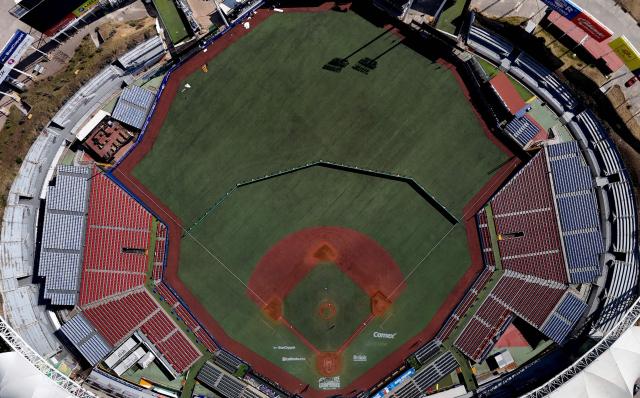 This aerial view shows the Pan American Baseball Stadium, the venue for the upcoming 2026 Caribbean Series, in Zapopan, Jalisco, Mexico on January 15, 2026. The diplomatic and military offensive by the United States deprived Venezuela of hosting and headlining the Caribbean Series, and in doing so also pushed Cuba out of this renowned baseball tournament. (Photo by ULISES RUIZ / AFP)