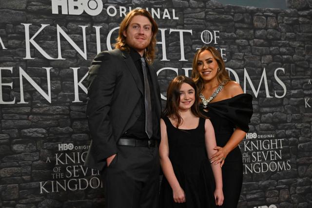 Irish actor and former rugby union player Peter Claffey (L) poses with his wife Ally McGinn (R) and his daughter Holly Keane-McGinnas as part of a red carpet event for the newly released HBO MAX production series "A Knight of the Seven Kingdoms", the new prequel of the Game of Thrones saga, in Rome on January 15, 2026. (Photo by Andreas SOLARO / AFP)