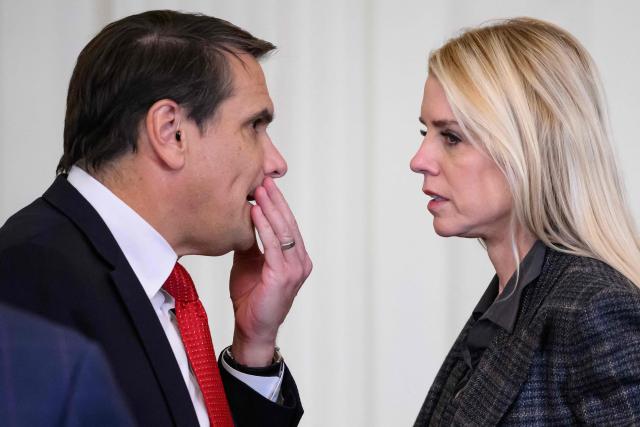 US Attorney General Pam Bondi (R) speaks with the Deputy Attorney General Todd Blanche following a ceremony with President Donald Trump and the Florida Panthers of the National Hockey League, winners of the 2025 Stanley Cup, in the East Room of the White House in Washington, DC on January 15, 2026. (Photo by MANDEL NGAN / AFP)