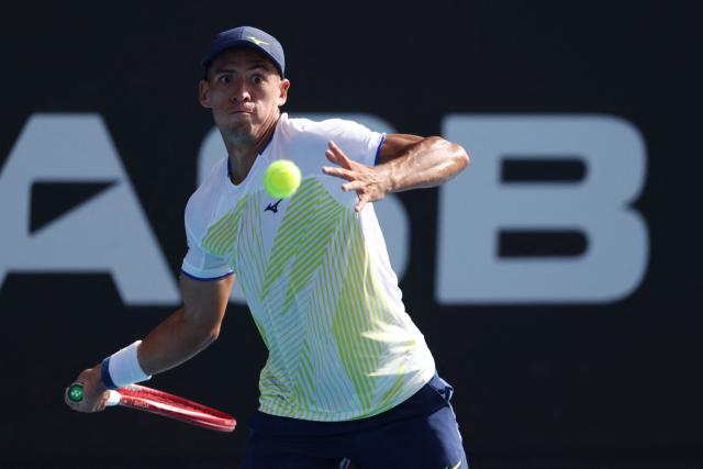 Argentina's Sebastian Baez hits a return against USA's Marcos Giron during their men's singles semi-final match at the ATP Auckland Classic tennis tournament in Auckland on January 16, 2026. (Photo by Michael Bradley / AFP)