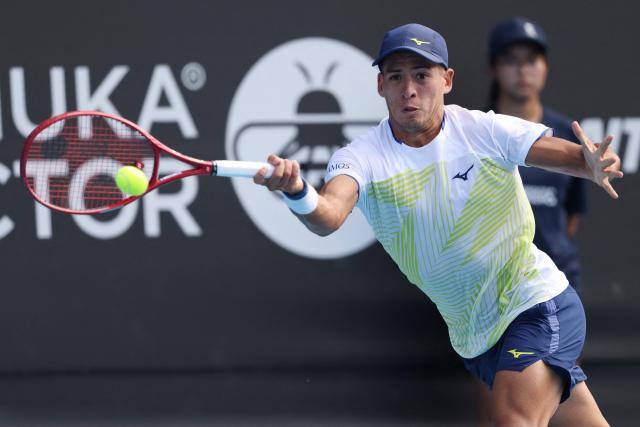 Argentina's Sebastian Baez hits a return against USA's Marcos Giron during their men's singles semi-final match at the ATP Auckland Classic tennis tournament in Auckland on January 16, 2026. (Photo by Michael Bradley / AFP)