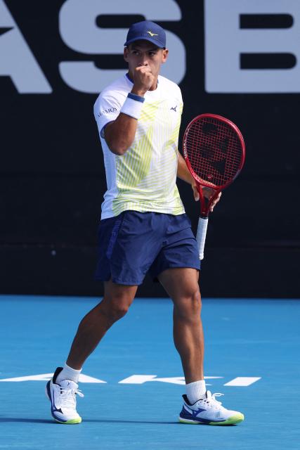 Argentina's Sebastian Baez reacts after a point against USA's Marcos Giron during their men's singles semi-final match at the ATP Auckland Classic tennis tournament in Auckland on January 16, 2026. (Photo by Michael Bradley / AFP)