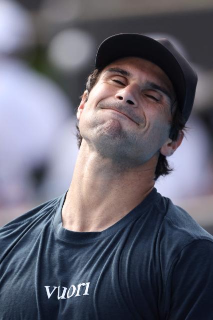 USA's Marcos Giron reacts after a point against Argentina's Sebastian Baez during their men's singles semi-final match at the ATP Auckland Classic tennis tournament in Auckland on January 16, 2026. (Photo by Michael Bradley / AFP)