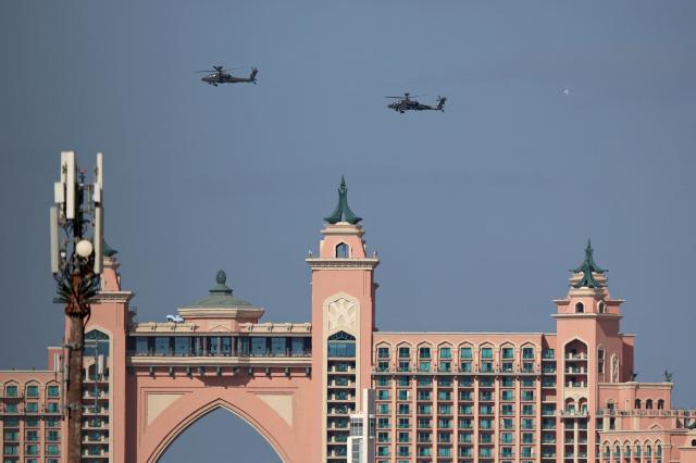 United Arab Emirates army helicopters fly over Atlantis The Palm Jumeirah resort, in Dubai on January 16, 2026. (Photo by Fadel SENNA / AFP)