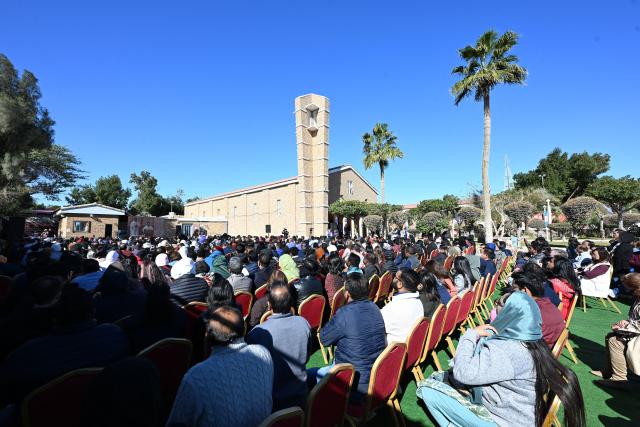 Christians living in Kuwait attend a ceremony marking the proclamation of the Parish Church of Our Lady of Arabia in Ahmadi as a Minor Basilica, in the city of Al-Ahmadi, 33 kilometers south of Kuwait City on January 16, 2026. The Church of Our Lady of Arabia is the first Minor Basilica in the Arabian Peninsula. It is considered the mother church of Kuwait. The first chapel was built in 1948, and the present church was constructed in 1957 as a gift from the Kuwait Oil Company. (Photo by YASSER AL-ZAYYAT / AFP)