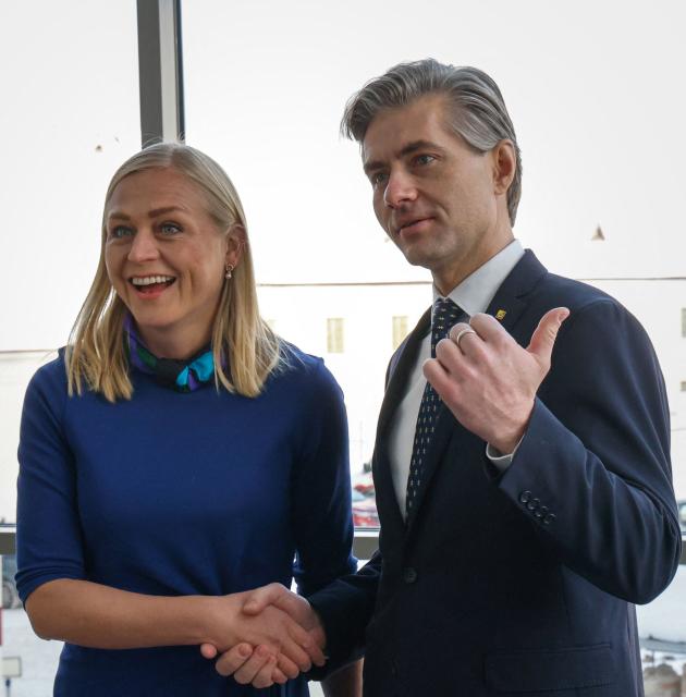 Finnish Foreign Minister Elina Valtonen and Lithuanian Foreign Minister Kestutis Budrys shake hands as he greets her prior to the traditional Snow Meeting Vilnius, Lithuania, on January 16, 2026. Vilnius hosts the traditional Snow Meeting, which will bring together foreign and security policy experts to discuss relevant topics on the political agenda. (Photo by Petras Malukas / AFP)
