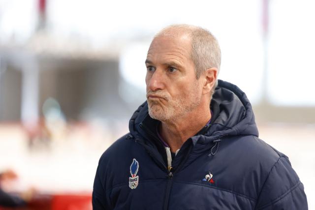 Speed Skater coach Alain Negre of France reacts during a training session in Inzell, southern Germany, on January 13, 2026. France’s speed skating team leader Timothy Loubineaud, a likely Olympic medal contender in Milan next month, is calling for the construction of a temporary long track ice rink dedicated to his sport for the 2030 Winter Games in the French Alps. (Photo by Michaela STACHE / AFP)