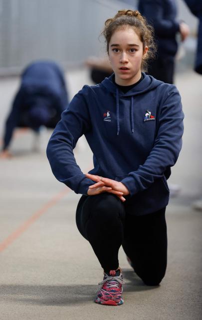 Speed Skater Violette Braun of France warms up during a training session in Inzell, southern Germany, on January 13, 2026. France’s speed skating team leader Timothy Loubineaud, a likely Olympic medal contender in Milan next month, is calling for the construction of a temporary long track ice rink dedicated to his sport for the 2030 Winter Games in the French Alps. (Photo by Michaela STACHE / AFP)
