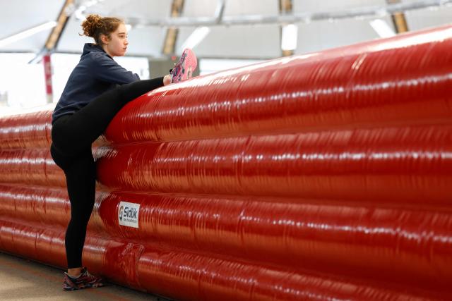 Speed Skater Violette Braun of France warms up during a training session in Inzell, southern Germany, on January 13, 2026. France’s speed skating team leader Timothy Loubineaud, a likely Olympic medal contender in Milan next month, is calling for the construction of a temporary long track ice rink dedicated to his sport for the 2030 Winter Games in the French Alps. (Photo by Michaela STACHE / AFP)