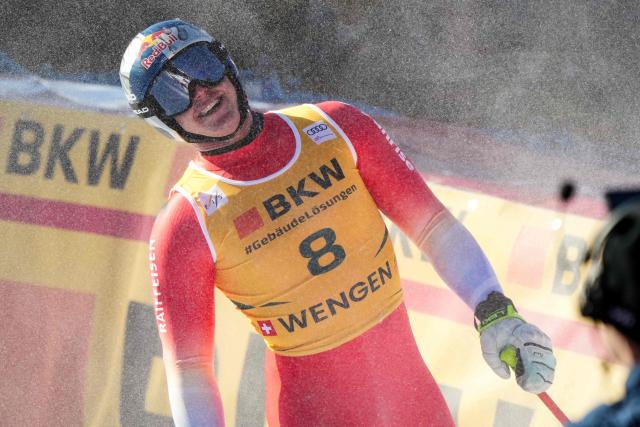Switzerland's Franjo Von Allmen reacts in the finish area after competing in the FIS alpine skiing Men's World Cup Super G event in Wengen, Swiss Alps, on January 16, 2026. (Photo by Dimitar DILKOFF / AFP)