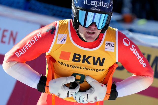 Switzerland's Stefan Rogentin reacts in the finish area after competing in the FIS alpine skiing Men's World Cup Super G event in Wengen, Swiss Alps, on January 16, 2026. (Photo by Dimitar DILKOFF / AFP)