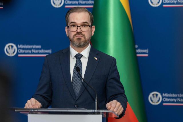 Lithuania's Minister of Defence Robertas Kaunas addresses a joint press conference with Poland's Minister of Defence at the Defence Ministry building in Warsaw on January 16, 2026. (Photo by Wojtek RADWANSKI / AFP)