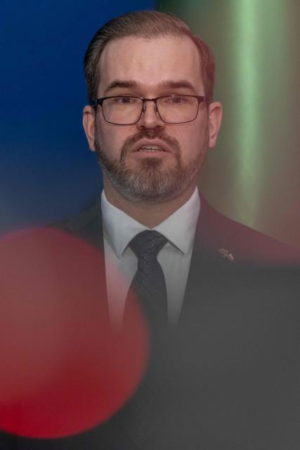 Lithuania's Minister of Defence Robertas Kaunas addresses a joint press conference with Poland's Minister of Defence at the Defence Ministry building in Warsaw on January 16, 2026. (Photo by Wojtek RADWANSKI / AFP)