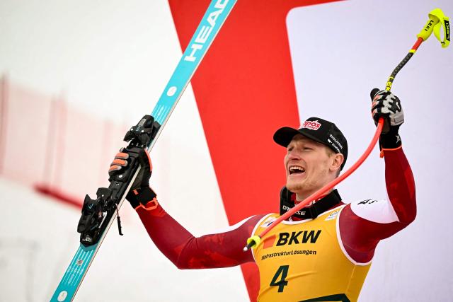 Austria's Stefan Babinsky celebrates his second place during the podium ceremony of the FIS alpine skiing Men's World Cup Super G event in Wengen, Swiss Alps, on January 16, 2026. (Photo by Fabrice COFFRINI / AFP)