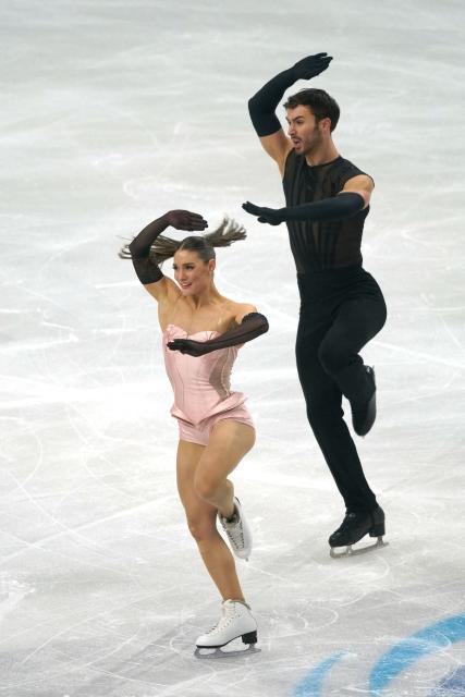 France's Laurence Fournier Beaudry and Guillaume Cizeron perform during the Ice Dance Rhythm Dance discipline on day four of the ISU Figure Ice Skating European Championships in Sheffield, northern England on January 16, 2026. (Photo by Ian HODGSON / AFP)
