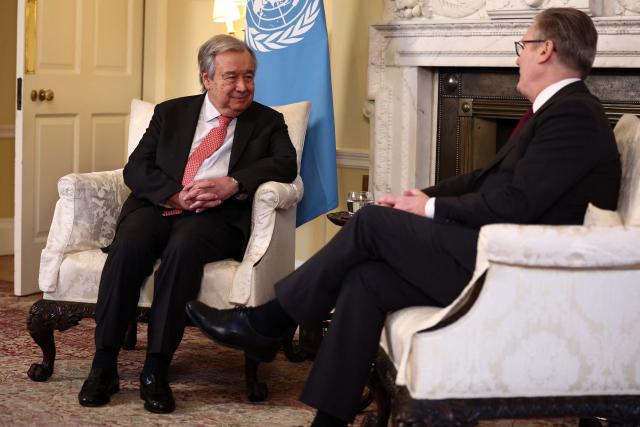 United Nations Secretary-General Antonio Guterres and Britain's Prime Minister Keir Starmer sit down for talks inside 10 Downing Street in central London on January 16, 2026. (Photo by HENRY NICHOLLS / POOL / AFP)