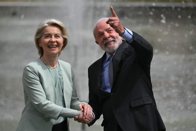 President of the European Commission Ursula von der Leyen and Brazil's President Luiz Inacio Lula da Silva shake hands during a meeting within the framework of the signing agreement between the European Union and Mercosur at Itamaraty Palace in Rio de Janeiro, Brazil, on January 16, 2025. Mercosur and the European Union will sign an agreement on January 17 in Paraguay that will create one of the largest free trade areas in the world, with the stated aim of seeking a “third way” between the United States and China, but which is causing friction with the European agricultural sector and industrialists in Brazil and Argentina. (Photo by Mauro PIMENTEL / AFP)