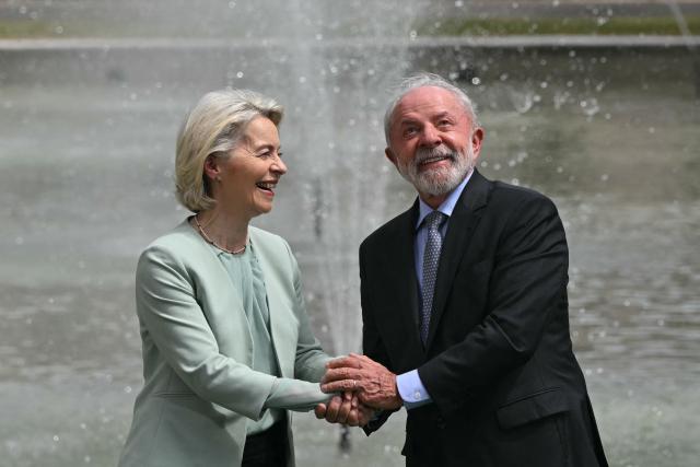 President of the European Commission Ursula von der Leyen and Brazil's President Luiz Inacio Lula da Silva shake hands during a meeting within the framework of the signing agreement between the European Union and Mercosur at Itamaraty Palace in Rio de Janeiro, Brazil, on January 16, 2025. Mercosur and the European Union will sign an agreement on January 17 in Paraguay that will create one of the largest free trade areas in the world, with the stated aim of seeking a “third way” between the United States and China, but which is causing friction with the European agricultural sector and industrialists in Brazil and Argentina. (Photo by Mauro PIMENTEL / AFP)
