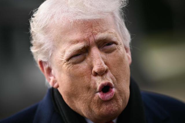 US President Donald Trump speaks to the press before boarding Marine One as he departs from the South Lawn of the White House in Washington, DC, on January 16, 2026. Trump is travelling to Palm Beach, Florida, to spend the weekend at his Mar-a-Lago residence. (Photo by Brendan SMIALOWSKI / AFP)