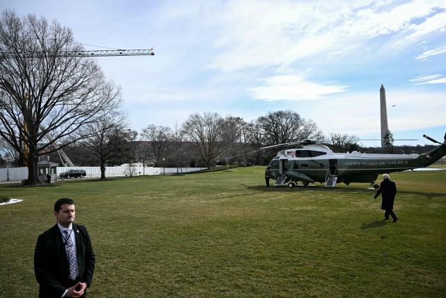 US President Donald Trump walks to board Marine One as he departs from the South Lawn of the White House in Washington, DC, on January 16, 2026. Trump is travelling to Palm Beach, Florida, to spend the weekend at his Mar-a-Lago residence. (Photo by Brendan SMIALOWSKI / AFP)