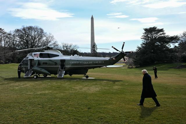 US President Donald Trump walks to board Marine One as he departs from the South Lawn of the White House in Washington, DC, on January 16, 2026. Trump is travelling to Palm Beach, Florida, to spend the weekend at his Mar-a-Lago residence. (Photo by Brendan SMIALOWSKI / AFP)