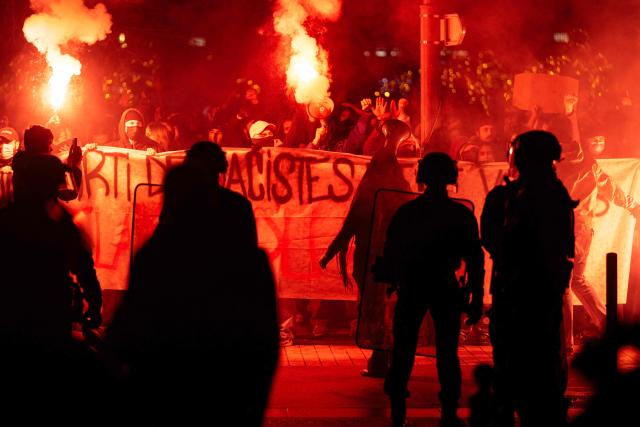 Left-wing protesters demonstrate against the meeting of President of the parliamentary group of the French far-right Rassemblement National (RN) party, Marine Le Pen with  French Member of Parliament for the Rassemblement National (RN) and candidate for the mayor of Marseille Franck Allisio in Marseille, southern France on January 16, 2026. (Photo by MIGUEL MEDINA / AFP)