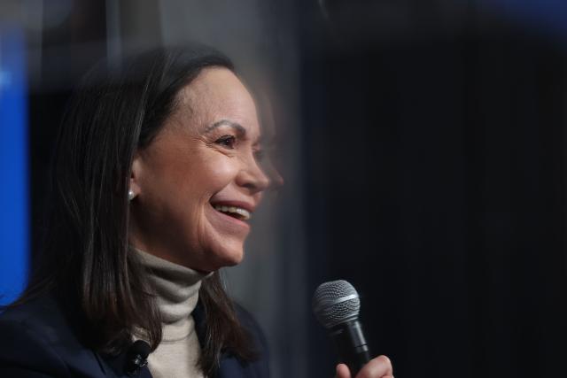 Venezuelan opposition leader and Nobel Peace Prize winner Maria Corina Machado speaks during a news conference at the Heritage Foundation headquarters in Washington, DC on January 16, 2026. Venezuelan opposition leader Maria Corina Machado said on January 15, she "presented" her Nobel Peace Prize medal to Donald Trump, in a bid to win over the US president who had sidelined her since overthrowing Nicolas Maduro. Her "wonderful gesture of mutual respect," as Trump called it Thursday, comes after the Republican said the award should have gone to him instead -- and after he refused to back Machado following the January 3 US military operation to capture Maduro. (Photo by Alex WROBLEWSKI / AFP)