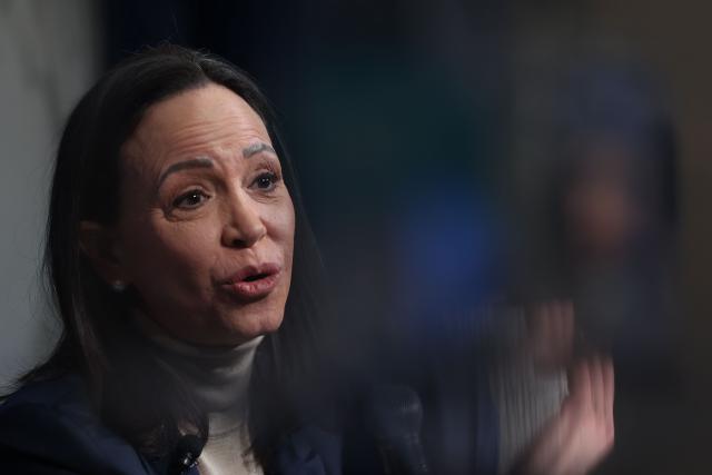 Venezuelan opposition leader and Nobel Peace Prize winner Maria Corina Machado speaks during a news conference at the Heritage Foundation headquarters in Washington, DC on January 16, 2026. Venezuelan opposition leader Maria Corina Machado said on January 15, she "presented" her Nobel Peace Prize medal to Donald Trump, in a bid to win over the US president who had sidelined her since overthrowing Nicolas Maduro. Her "wonderful gesture of mutual respect," as Trump called it Thursday, comes after the Republican said the award should have gone to him instead -- and after he refused to back Machado following the January 3 US military operation to capture Maduro. (Photo by Alex WROBLEWSKI / AFP)