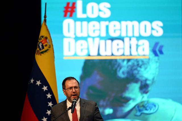 Venezuela's Minister of Foreign Affairs Yvan Gil Pinto speaks during a forum organized by the "Network of Lawyers for the Release of President Nicolas Maduro and First Lady Cilia Flores" at the Teresa Carreno Theater in Caracas on January 16, 2026. US Central Intelligence Agency chief John Ratcliffe met Venezuela's interim leader Delcy Rodriguez in Caracas on January 15, a US administration official said, in the highest-level American visit since the fall of Nicolas Maduro. (Photo by Federico PARRA / AFP)