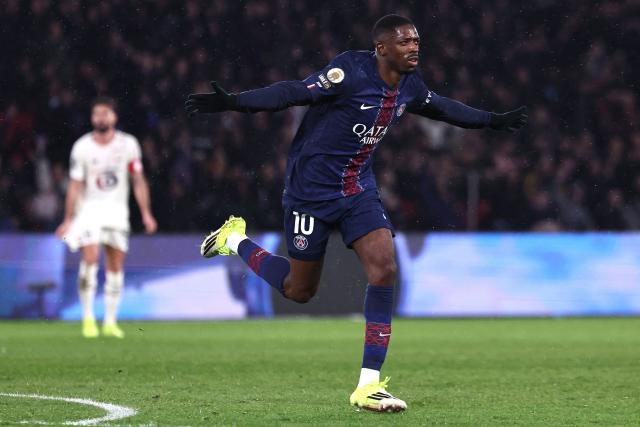 Paris Saint-Germain's French forward #10 Ousmane Dembele (R) celebrates after scoring Paris Saint-Germain's first goal during the French L1 football match between Paris Saint-Germain (PSG) and Lille LOSC at the Parc des Princes stadium in Paris on January 16, 2026. (Photo by Anne-Christine POUJOULAT / AFP)