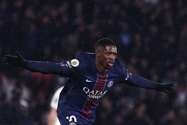 Paris Saint-Germain's French forward #10 Ousmane Dembele celebrates after scoring Paris Saint-Germain's first goal during the French L1 football match between Paris Saint-Germain (PSG) and Lille LOSC at the Parc des Princes stadium in Paris on January 16, 2026. (Photo by Anne-Christine POUJOULAT / AFP)