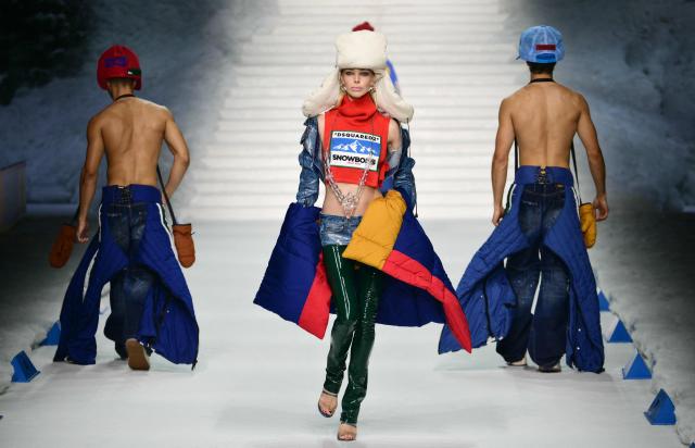 Models present creations of the DSquared2 brand designed by Dean and Dan Caten during the Milan Fashion Week for the Men's Fall/Winter 2026-2027 collection in Milan, on January 16, 2026. (Photo by Stefano RELLANDINI / AFP)