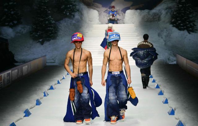 Models present creations of the DSquared2 brand designed by Dean and Dan Caten during the Milan Fashion Week for the Men's Fall/Winter 2026-2027 collection in Milan, on January 16, 2026. (Photo by Stefano RELLANDINI / AFP)
