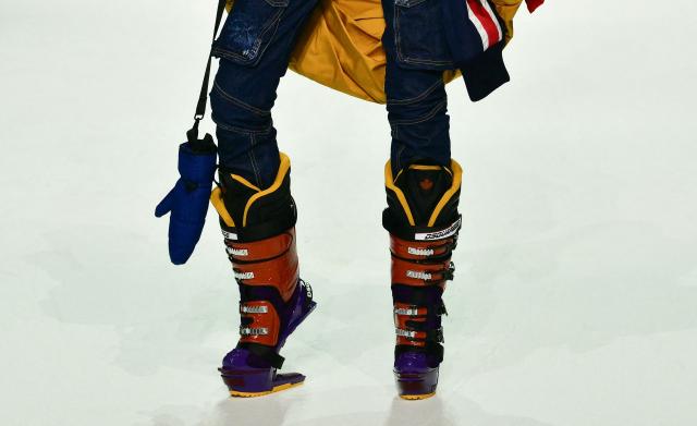 A model presents a creation of the DSquared2 brand designed by Dean and Dan Caten during the Milan Fashion Week for the Men's Fall/Winter 2026-2027 collection in Milan, on January 16, 2026. (Photo by Stefano RELLANDINI / AFP)