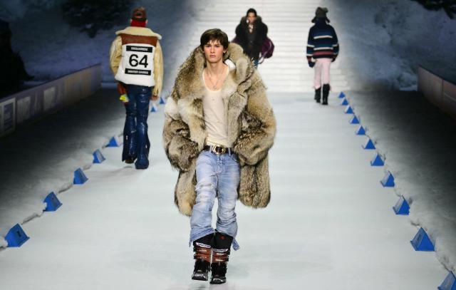 A model presents a creation of the DSquared2 brand designed by Dean and Dan Caten during the Milan Fashion Week for the Men's Fall/Winter 2026-2027 collection in Milan, on January 16, 2026. (Photo by Stefano RELLANDINI / AFP)