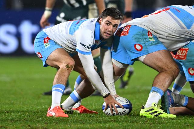 Bulls' South African scrum-half Zak Burger clears the ball out of a ruck during the European Champions Cup, first round, day 4, pool 4, rugby union match between Section Paloise (Pau) and Bulls (Pretoria) at the stade du Hameau in Pau, southern France, on January 16, 2026. (Photo by GAIZKA IROZ / AFP)