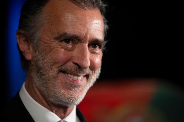 Liberal Initiative Party candidate for Portugal’s presidency, Joao Cotrim Figueiredo, gestures during a campaign dinner in Braga, northern Portugal, on January 16, 2026. Portugal will hold presidential elections on 18 January. (Photo by MIGUEL RIOPA / AFP)