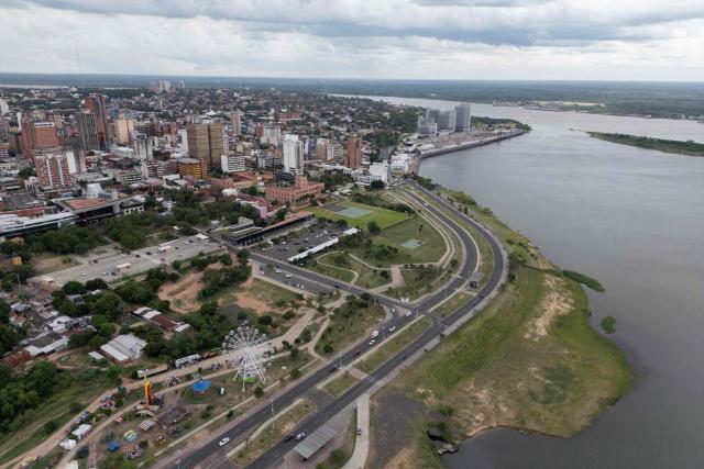 Aerial view of Asuncion, Paraguay on January 16, 2026. (Photo by Luis ROBAYO / AFP)