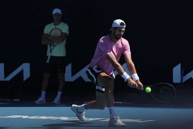 Russia's Karen Khachanov attends a practice session ahead of the 2026 Australian Open tennis tournament in Melbourne on January 17, 2026. (Photo by Martin KEEP / AFP)