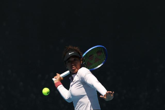Japan's Naomi Osaka hits a return during a practice session ahead of the 2026 Australian Open tennis tournament in Melbourne on January 17, 2026. (Photo by DAVID GRAY / AFP)