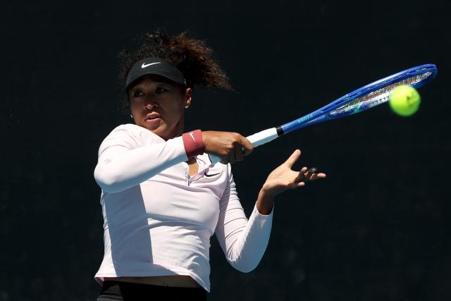 Japan's Naomi Osaka hits a return during a practice session ahead of the 2026 Australian Open tennis tournament in Melbourne on January 17, 2026. (Photo by DAVID GRAY / AFP)