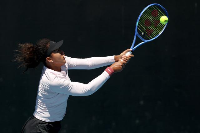 Japan's Naomi Osaka arrives for a practice session ahead of the 2026 Australian Open tennis tournament in Melbourne on January 17, 2026. (Photo by DAVID GRAY / AFP)