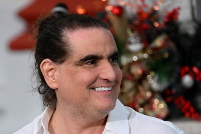 (FILES) Colombian businessman Alex Saab leaves after a meeting with Venezuela's President Nicolas Maduro (out of frame) at the Miraflores Presidential Palace in Caracas on December 20, 2023. Venezuela's interim President Delcy Rodriguez dismissed Colombian businessman Alex Saab from his post of Minister of Industry on January 16, 2025. Saab has been accused of being a front man for the deposed President Nicolas Maduro. The change comes amid pressure from Washington following the attacks on January 3. (Photo by Federico Parra / AFP)